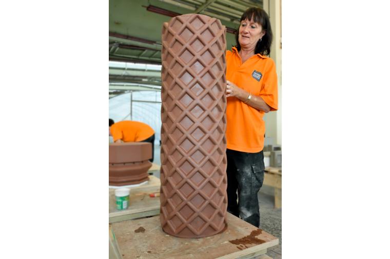 1) Hand finishing architectural terracotta ensures the character of the original piece is replicated as this Tudor chimney pot shows