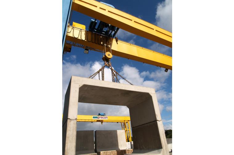 1) An innovative Matière modular concrete box bridge casting being lifted by a new crane.