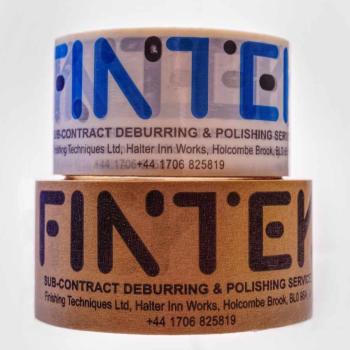 1) At Fintek paper tape (bottom) is replacing plastic tape (top) saving the equivalant of 9 miles in a single year
