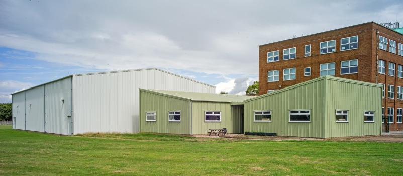 2) Sited next to the sports hall previously built by Smart Space, the building required far less groundwork than conventional construction