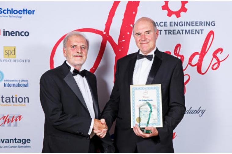 1) Richard Burslem (right) receiving the award from Alin Hick. (Image courtesy of Bandele Zuberi - high resolution images available to purchase http://clients.bandelezuberi.com/gallery/sea-awards-2018/)